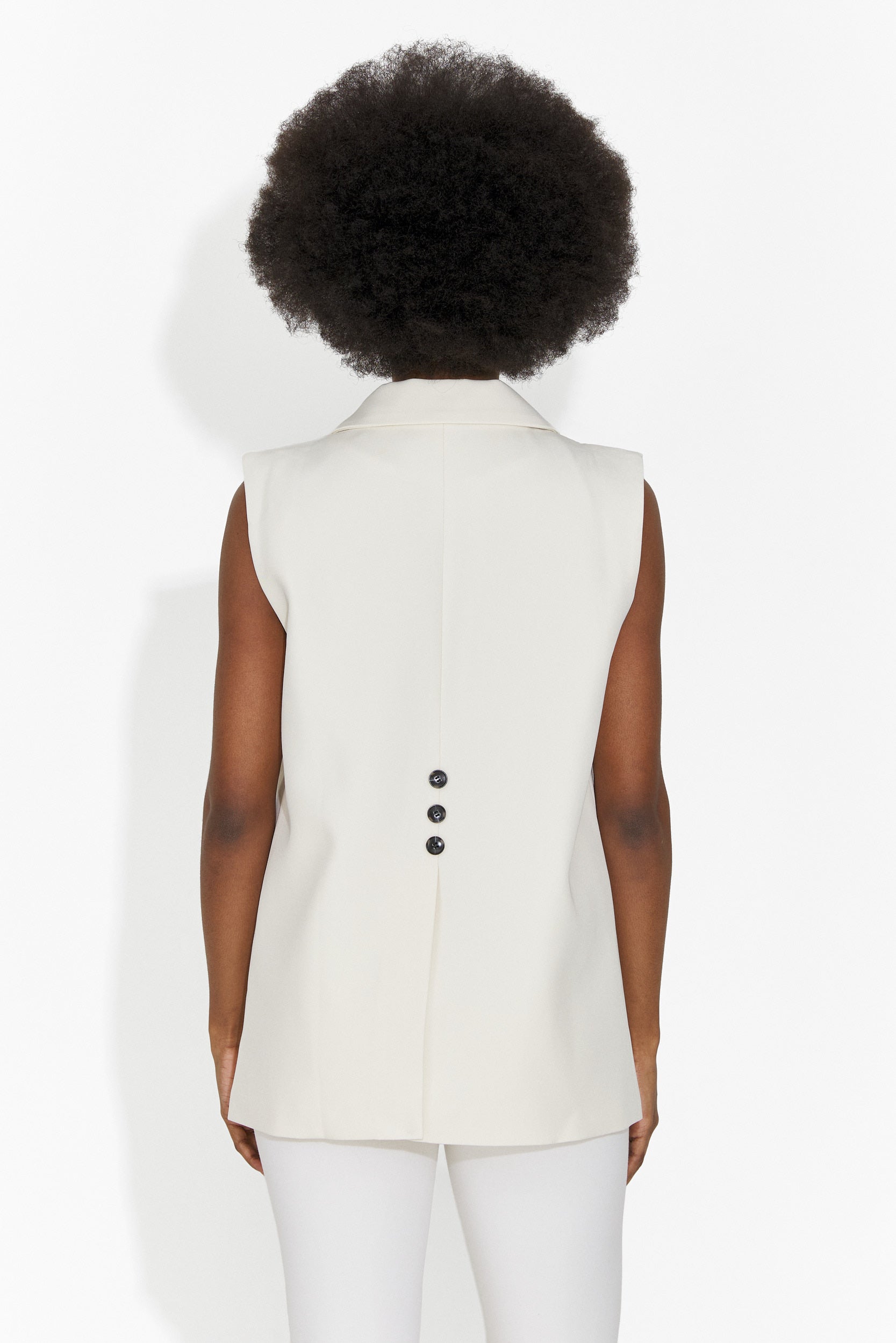 Елегантен дамски елек крем Ангила Богас